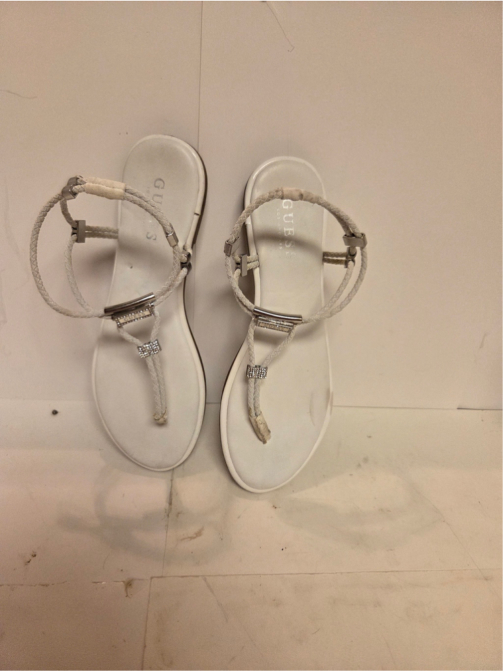 Women's Guess White Thong Sandals with Silver Accents